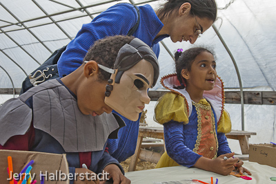 Marisa Dequadros with her children, Felica and Alex, making art